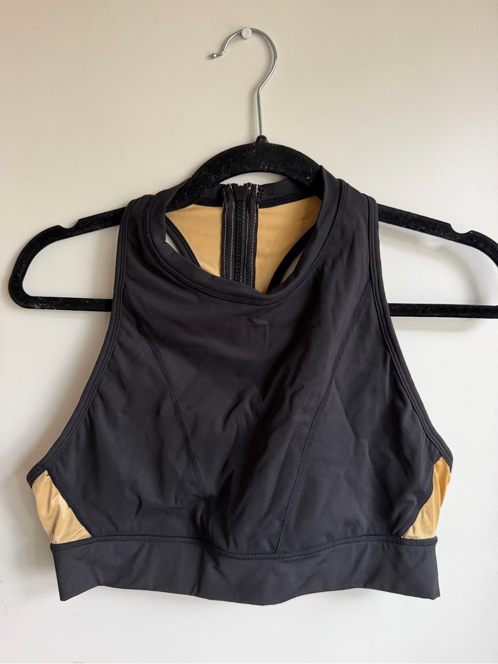Alala Black and Tan High-Neck Zip-Back Sports Bra